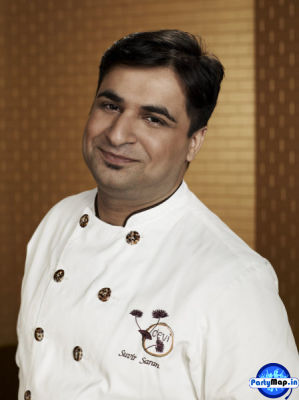 Photo of Suvir Saran at a concert