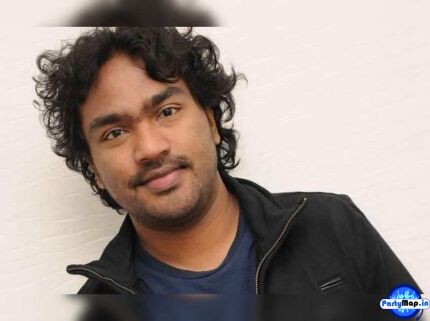 Photo of Arjun Janya at a show